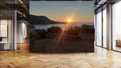 Sunset in Giglio Campese with Montecristo island in the background, Tuscan archipelago, Tyrrhenian sea, Italy Wall mural