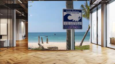 tsunami signboard in the beach, thailand, ko lanta island Wall mural