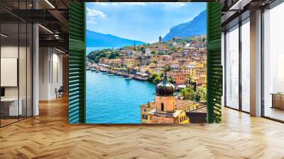 Window overlooking the village Limone Sul Garda on Garda Lake. The most famous tourist destination on lake. Lombardy, Italy. Wall mural