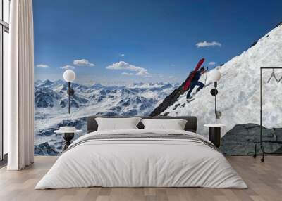 Ski mountaineering extreme. Skitour in steep terrain. Exhausting climb to the summit. Beautiful mountain landscape. Davos Klosters Swiss Alps Wall mural