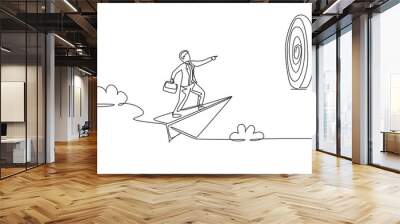 Continuous one line drawing young male worker focus flying with paper air plane into target dartboard. Success business manager. Minimalist concept. Single line draw design vector graphic illustration Wall mural