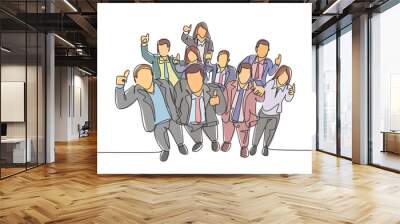 One single line drawing of young happy male and female managers raise their hand into the air and giving thumbs up gesture. Business celebration concept continuous line draw design vector illustration Wall mural