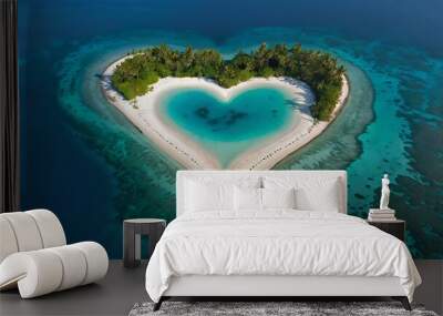 Aerial view of a heart-shaped tropical island surrounded by deep blue ocean waters  Wall mural