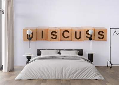 Discuss Word Written In Wooden Cube With White Background Concept Wall mural