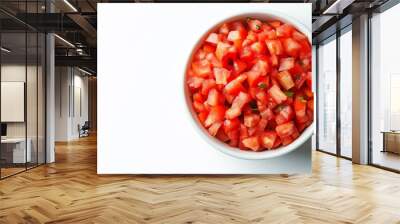 38. Top view of freshly diced tomatoes in a bowl, set against a white background, capturing the vibrant color and natural texture of the tomatoes Wall mural