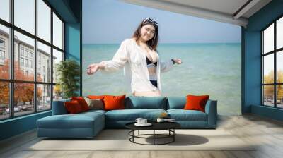 Woman young asian fat chubby cute beautiful smile happy fun enjoy relax freedom bikini swimwear body sexy plus size sea beach white sand clean blue sky calm nature ocean wave water travel on holiday Wall mural