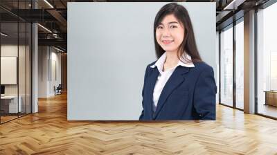 portrait of asian business woman standing on gray Wall mural