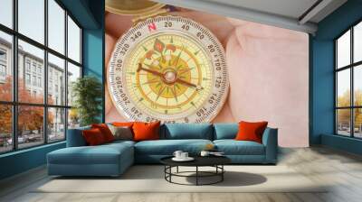 Compass in the hand Wall mural