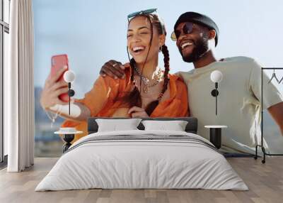 Couple, bonding and phone selfie on city building rooftop on New York summer holiday, travel vacation date or social media memory. Smile, happy or black man and woman on mobile photography technology Wall mural