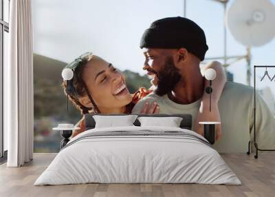 Interracial couple, hug and bonding on city building rooftop for summer holiday, travel vacation date and location break in Boston. Smile, happy black man and talking woman or student fashion friends Wall mural