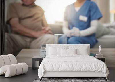 A nurse is a patients best friend. Shot of a vaccine and pamphlet on a table during a checkup at home. Wall mural