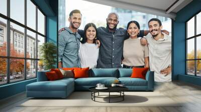 Im so happy I work with these people. Shot of a team of colleagues together in their office. Wall mural