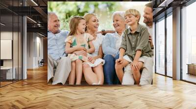 Love, smile and a big family on a sofa in the living room of their home together during a visit. Happy, trust or support with young children, parents and grandparents bonding in an apartment Wall mural