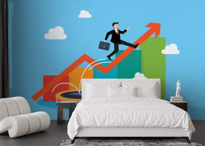 Businessman bounce on trampoline business concept Wall mural