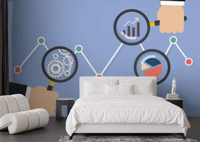 Hands holding magnifying glass for data analysis Wall mural