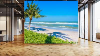 Beautiful tropical beach sea ocean with palm tree Wall mural