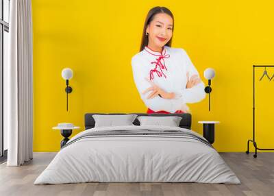 Portrait beautiful young asian woman smile in action Wall mural