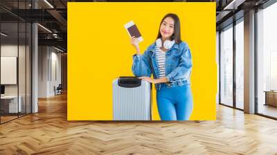 Portrait beautiful young asian woman travel and leisure with luggage bag and passport Wall mural