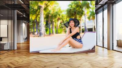 Portrait beautiful young asian women relax smile happy around sea beach ocean Wall mural