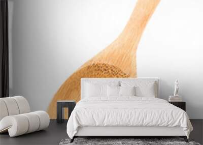 Wooden spoon isolated on white background Wall mural