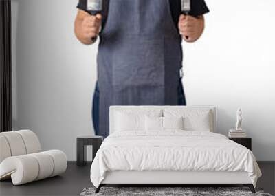 Full body portrait of a worker man or Serviceman in Black shirt and apron is holding paint brush isolated on white background Wall mural