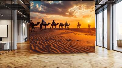 Photograph of an Indian camel (camel driver), a Bedouin with a camel silhouette in the sand dunes of the Thar desert at sunset. Caravan in Rajasthan travel adventure safari background  Wall mural