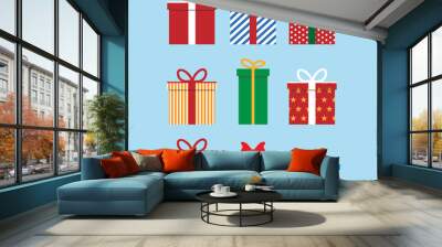 Set of colorful icons of gift boxes. Flat design for Christmas present, love valentine present on blue background. Vector illustration. Wall mural