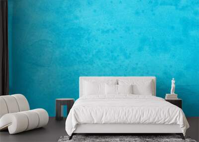 Blue concrete stone texture for background in summer wallpaper. Cement and sand wall of tone vintage. Concrete abstract wall of light cyan color. Wall mural