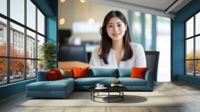 Smiling Professional Woman in Modern Office Setting Wall mural