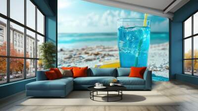 A glass of blue lemonade is on a beach with a straw in it generative ai Wall mural