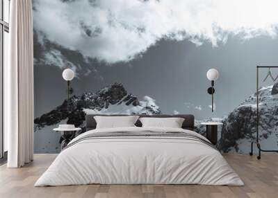 Close up of snow mountain with bright blue sky in monochrome Wall mural