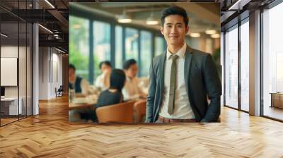 Asian young male happy smiling professional business, happy confident positive female entrepreneur in office business co-working, looking at camera. Wall mural