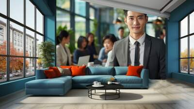 Asian young male happy smiling professional business, happy confident positive female entrepreneur in office business co-working, looking at camera. Wall mural