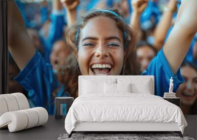 Blue sports fans scream as they support their team from the stadium - football supporters have fun at the event Wall mural