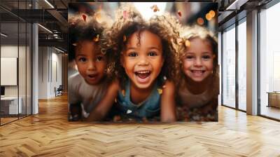 Children's group. Happy multicultural children having fun celebrating their birthdays with colorful confetti. child birthday concept Wall mural