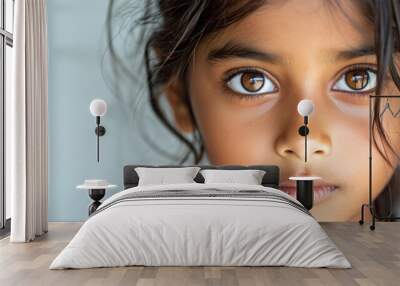 Closeup photo of beautiful Asian Indian teenage girl waiting. Copyrighted children's advertisements Wall mural