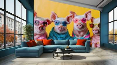 creative animals A group of piglet pigs in strange, mismatched and brightly colored outfits are isolated on a new background ad. birthday party invitation banner Wall mural