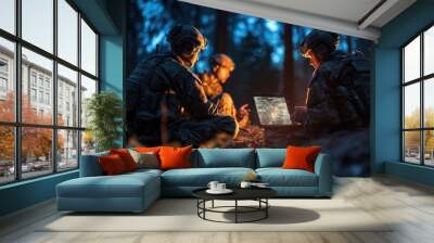 military special operation or soldiers in the forest at night reviewing a plan of action on a laptop Wall mural