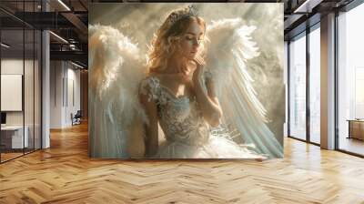 The woman is elegant in a white lace dress with tulle and feathers. Decorated with a crystal crown and angel wings. while exploring fairy tales Wall mural