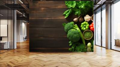 Vegan food themes. Table top view background of a variation green vegetables with stethoscope. Wall mural