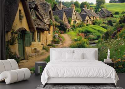 A row of cottages with a path running between them. The houses are surrounded by a lush green garden and a small stream. The scene is peaceful and serene Wall mural