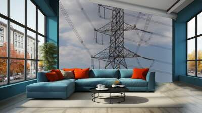 high voltage post.High-voltage tower on blue sky. Wall mural