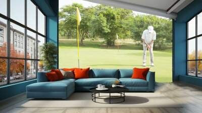 widely golf  course in very nice day summer with player Wall mural