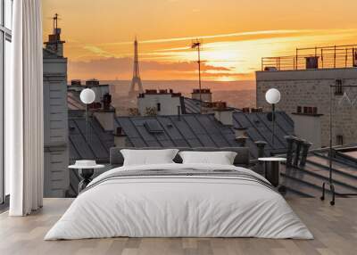 The Eiffel Tower and the rooftops of Paris seen from Montmartre with a sunset Wall mural