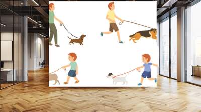  Young guy and kids walking with dogs vector set Wall mural