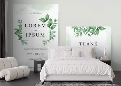 Elegant wedding invitation card with green foliage Wall mural