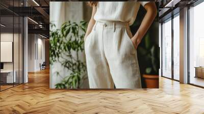 Organic linen trousers with minimalist cut, ethical fashion, sustainable simplicity Wall mural