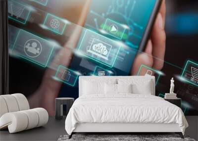 Concept technology internet and networking, hand holding smartphone with media icon on digital display. Wall mural