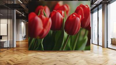 A close-up of red tulips, symbolizing love and affection, perfect for romantic and Valentine Day campaigns Wall mural