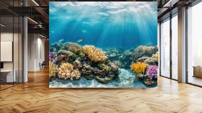 A thriving coral reef with diverse marine life, illustrating a vibrant marine ecosystem in clear blue waters Wall mural